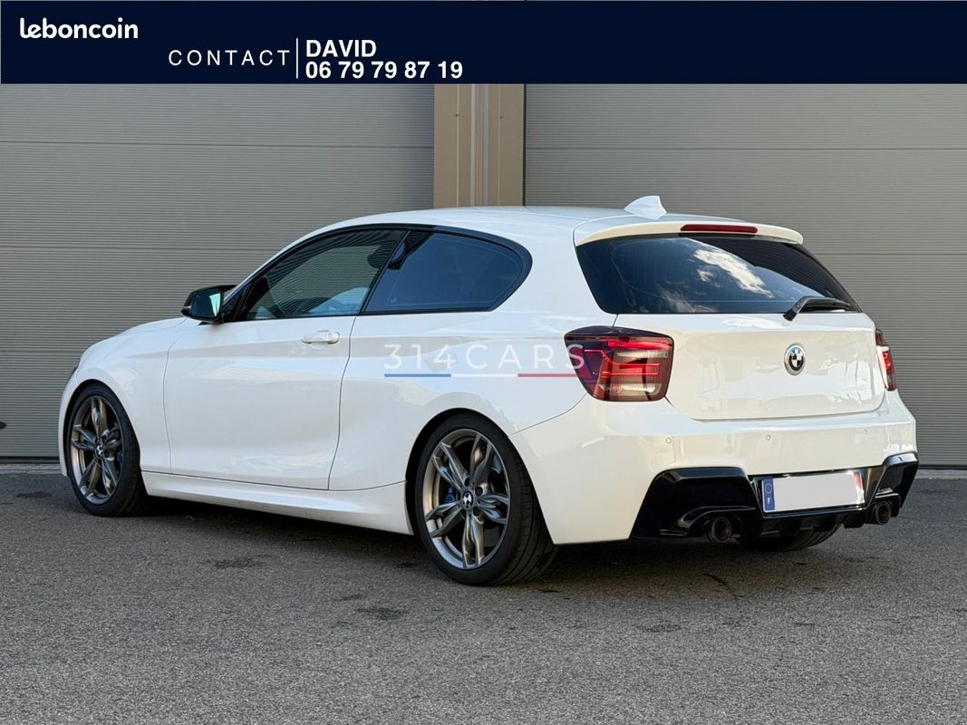 BMW M135i xDrive 320 2014 — vue 3