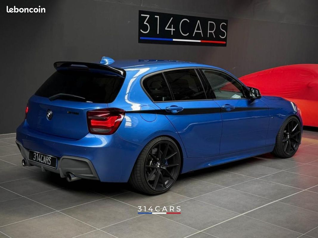 BMW M135i xDrive 320 2015 — vue 3