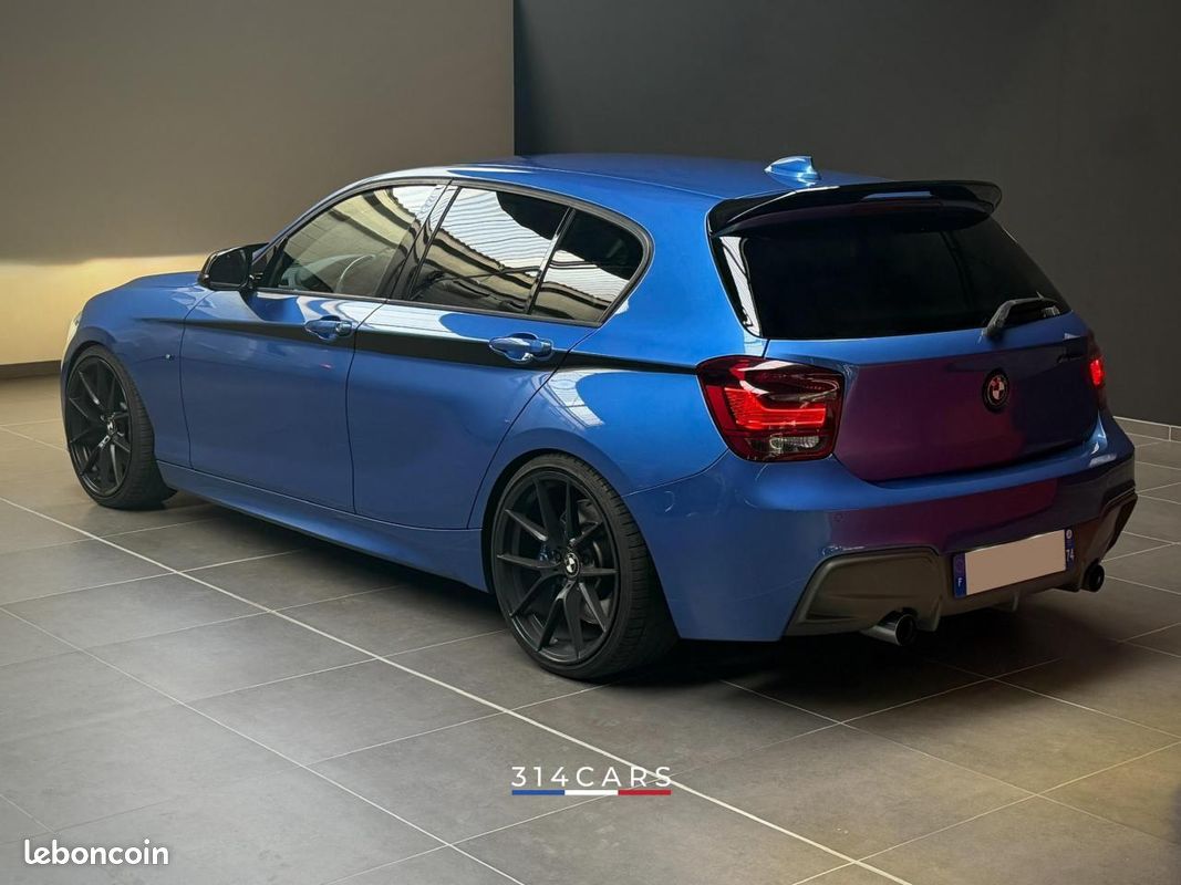 BMW M135i xDrive 320 2015 — vue 5
